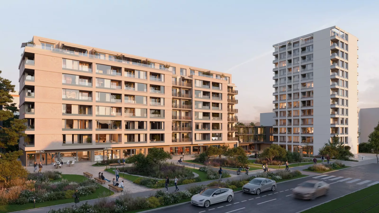 ELEMENT Malešice – pohled z ulice na bytový dům s věží a parkovou úpravou před domem